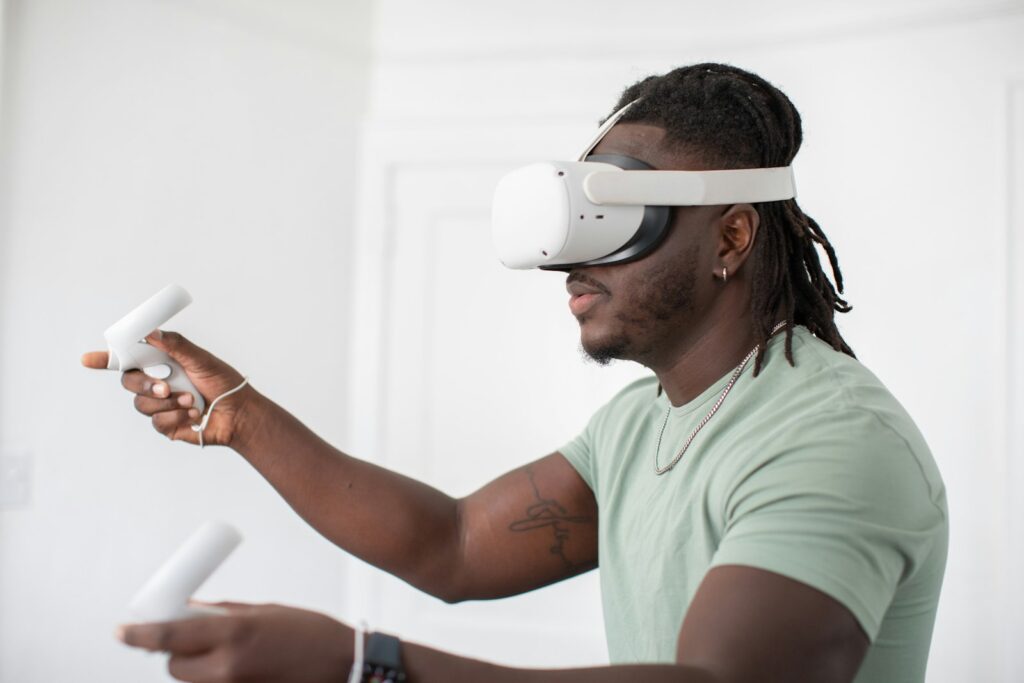 Person using a VR headset and controllers, illustrating immersive experiences as the product